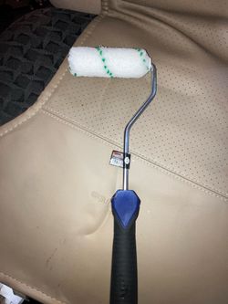 New paint roller and new trowel