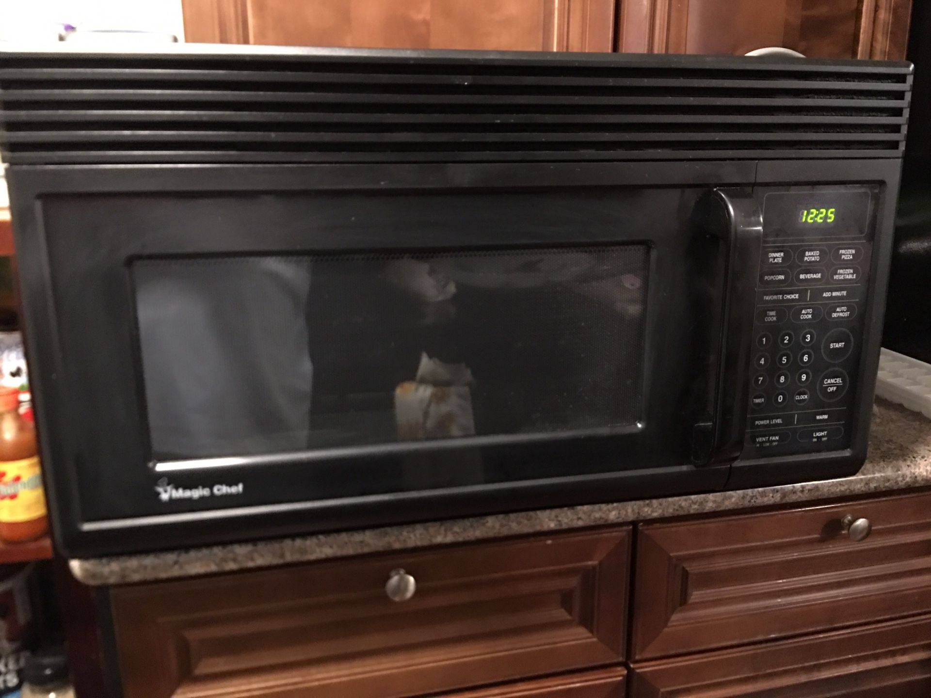 Magic Chef 1.6 cu. ft. Over the range microwave in black
