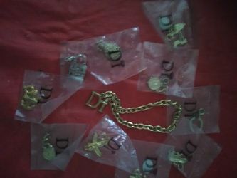 Diamonds international charm bracelet w/charms