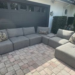 Sectional/Modular Sofa Rooms to go Laney Park Grey 7 Pieces (1 Rest-Arm )  