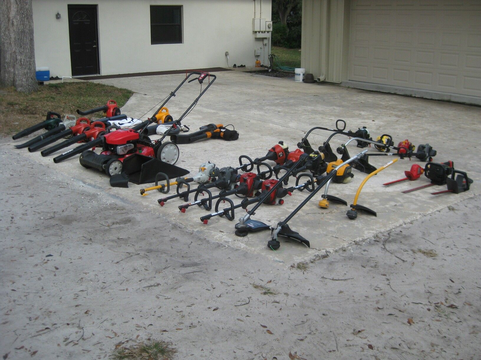 Large selection of lawn equipment for sale.