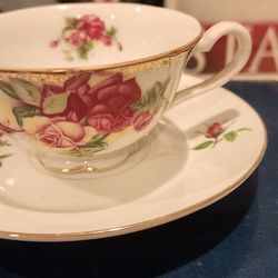 Vintage ROSES TEA CUP and SAUCER gold Trim 