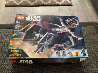 LEGO Star Wars set, number 75393, is the TIE Fighter & X-Wing Mash-up based on the Rebuild the Galaxy special dented box