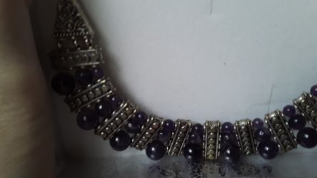 Amethyst necklace with Aztec style accents.