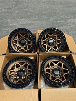 KMC Torx Bronze Black Lip 17” Wheels Off-Road Chevy GMC 6x5.5 Available Brand New Rims