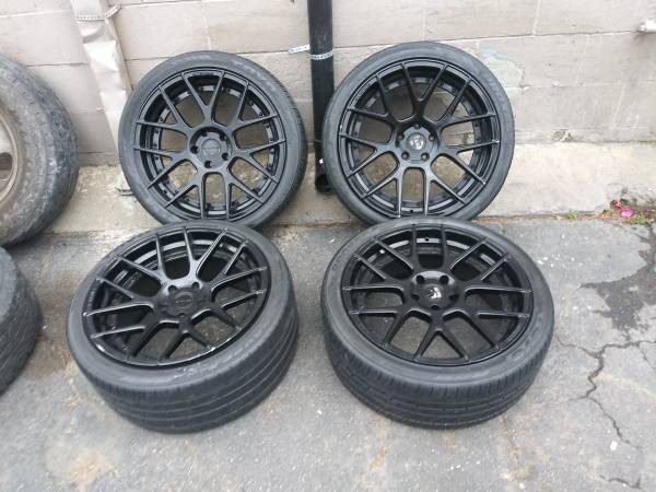 Stance 20 inch black alloy rims with old tires. 5 on 120mm