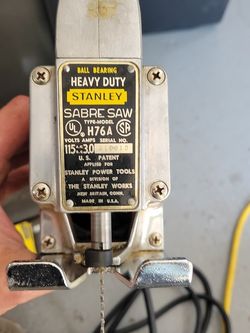 Saw With Case And A Bunch Of Blades