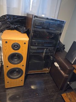 Variety of items stereo system, speakers, and queen box spring new and metal bed frame