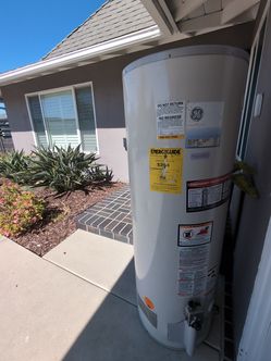 Old water heater- for parts or scrap