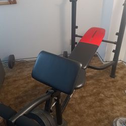 Down Weight Bench And 100 Lb Of Iron