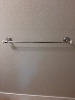 Light, Towel Bar, Hand Towel Ring And Toilet Paper Holder.