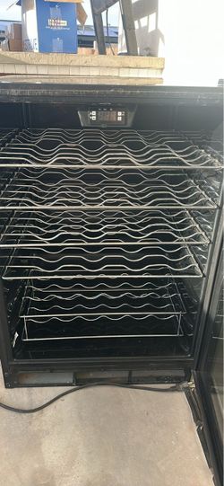 Magic Chef 50 bottle wine refrigerator. Works great. $100.
