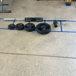 15 Pound 5 Foot Barbell With 85 Pound Of Weight, With Adjustable Squat Rack. Landmine Attachment And Squat Pad Not Included