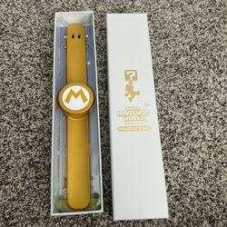 Limited Edition Super Nintendo World Mario Gold Power Up Band 