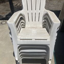 White Plastic Adirondack Chairs.  
