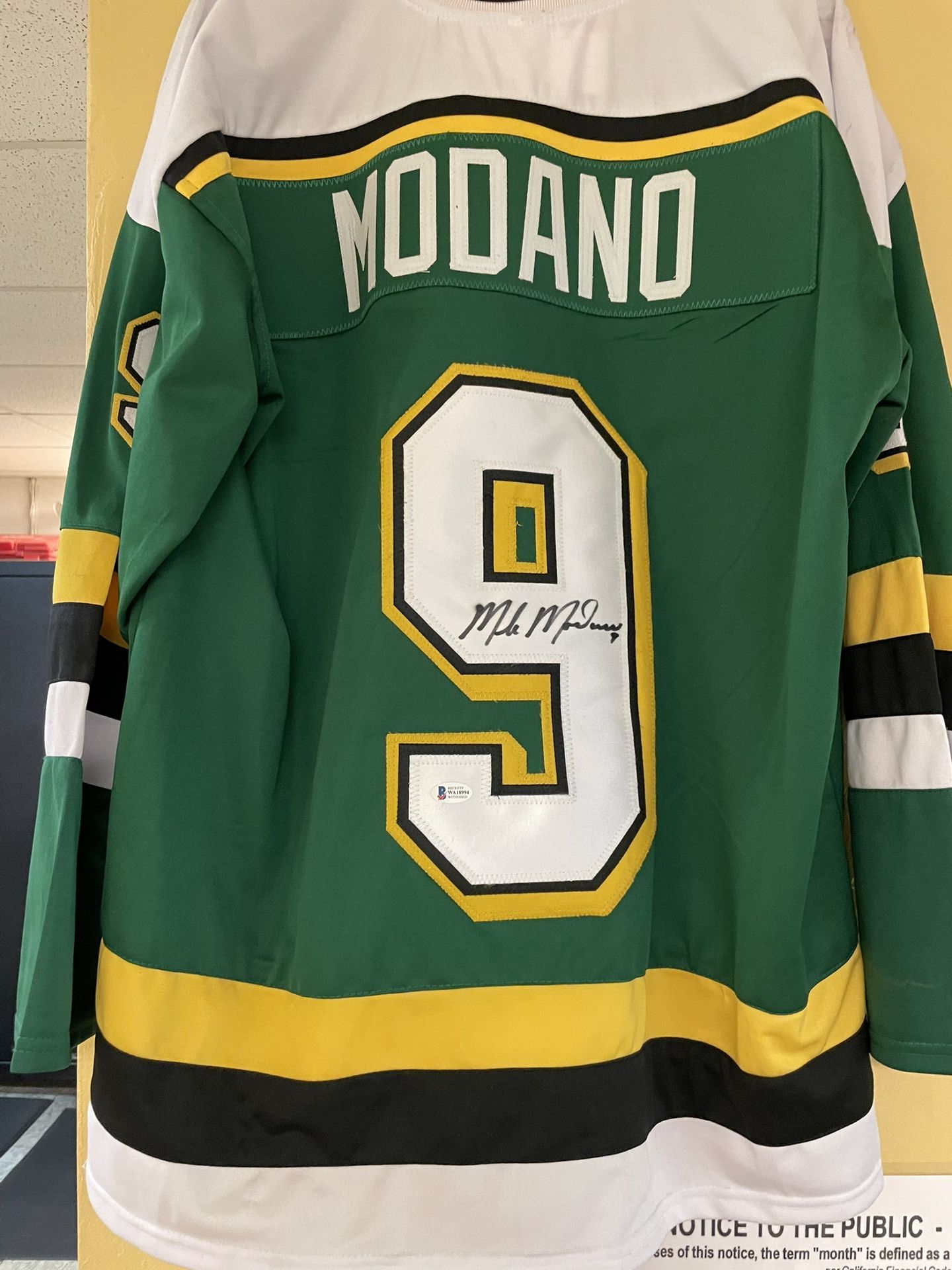 Signed Mike Modano Throwback Minnesota North Stars rep jersey