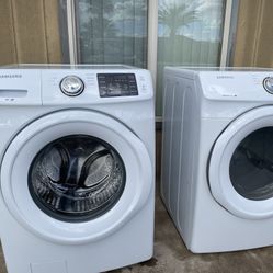 Gray LG TROMM washer and  Dryer