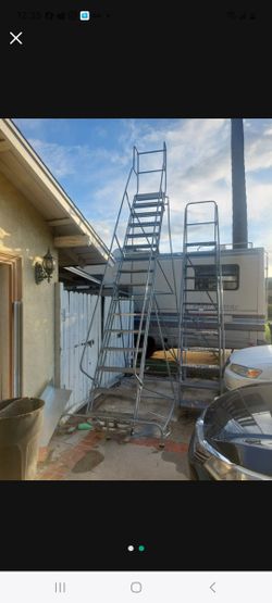 Rolling Ladder  16 Steps  Perfect Condition  450.00