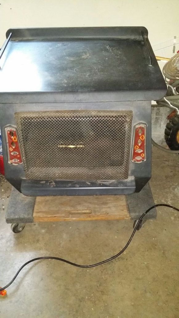 *PRICE REDUCTION*Wood burner w/blower and removable door for screen.