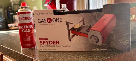 Outdoor portable camping stove by GasOne and 12 canisters of Butane by Kobest brand.