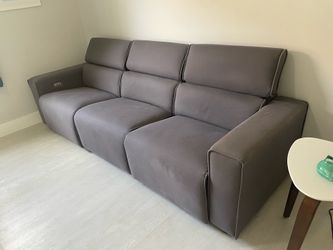 Grey couch with recliners