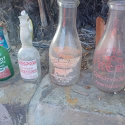 old milk bottles and shampoo 