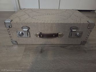 Studded suitcase