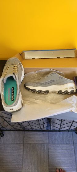 Skechers D'lites open back slip ons.