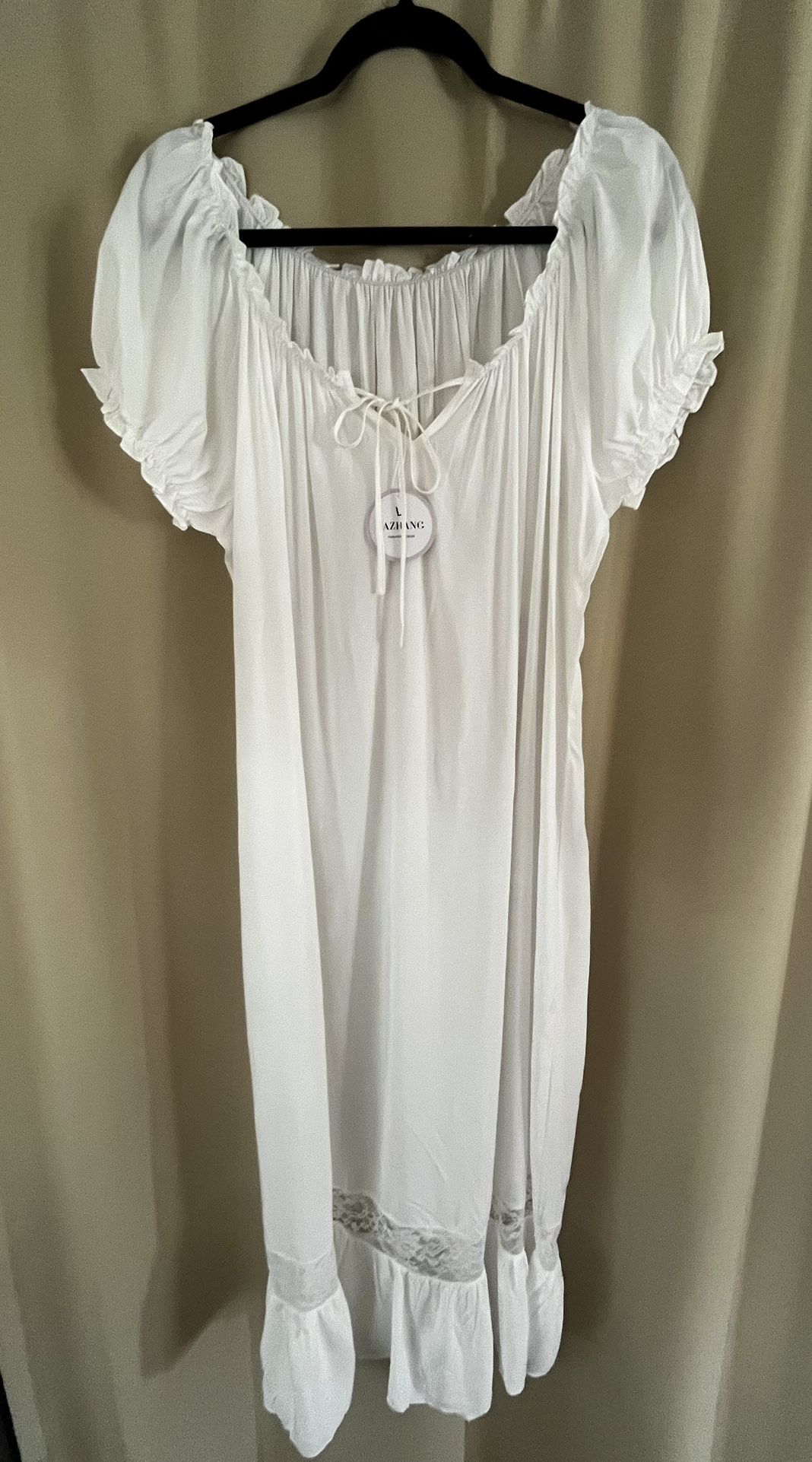 Brand New Women’s Off-White nightgown size large.