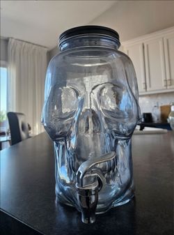Halloween skull dispenser with spout