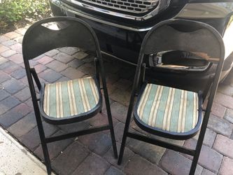 Set of two vintage black wooden folding chairs