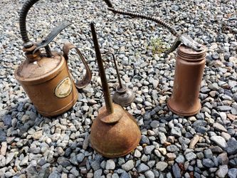 Antique Oil cans'