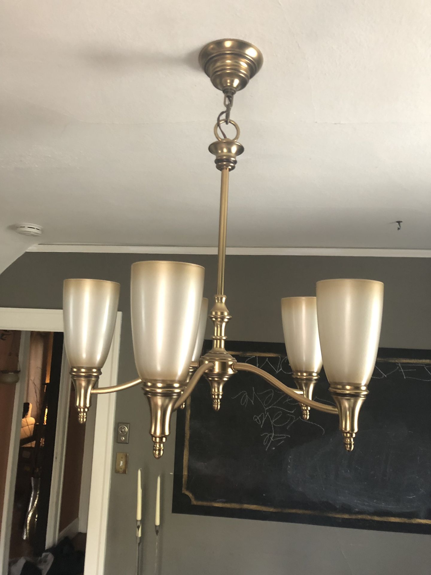 Chandelier like new in satin gold finish