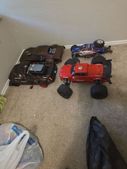 Traxxas Rustler, & EMaxx+Arrma Outlaw/Infraction high-bred.