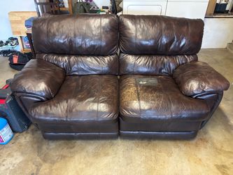 Brown leather recliner sofa