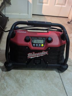 M18 (radio) with a power cord.