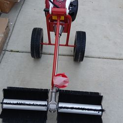 Hand pushed lawn sweeper