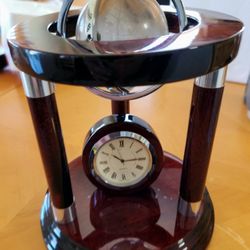 Clock With Glass Globe