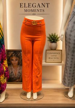 Turn heads with these stunning orange statement pants — designed to bring confidence, elegance, and modern style together. The sleek high-waist fit en