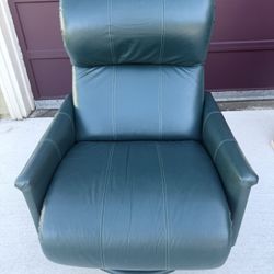 LEATHER RECLINER - Swivels & Rocks