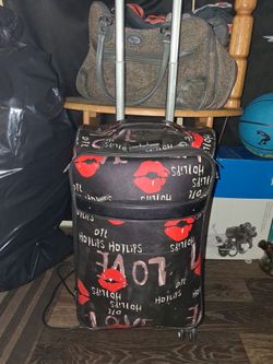 Love roll on suitcase
