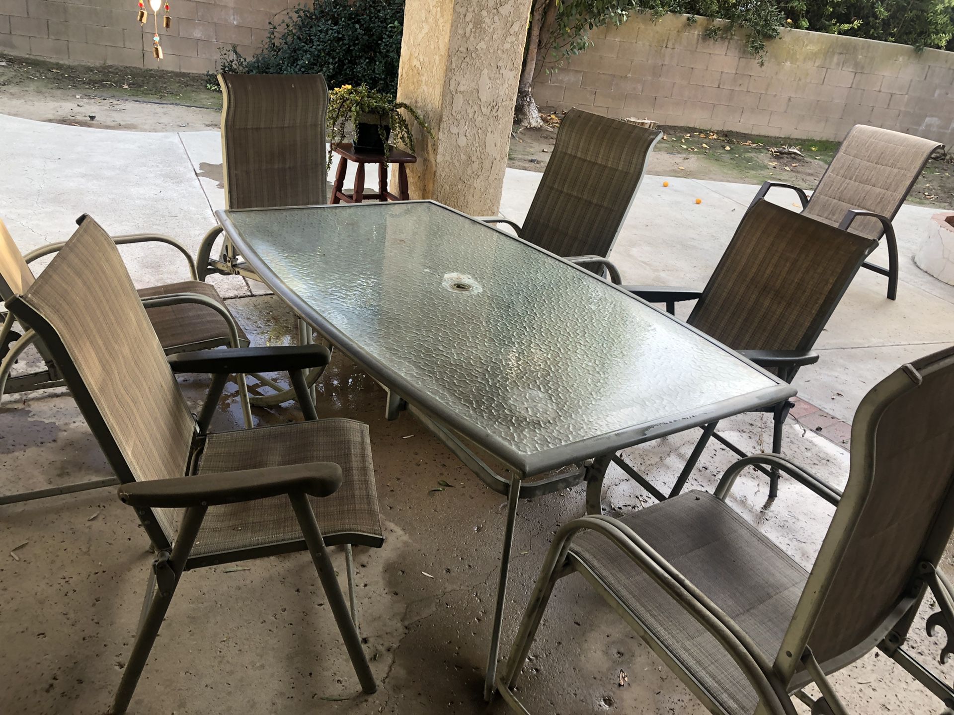 Patio furniture 6 piece chair set with table.