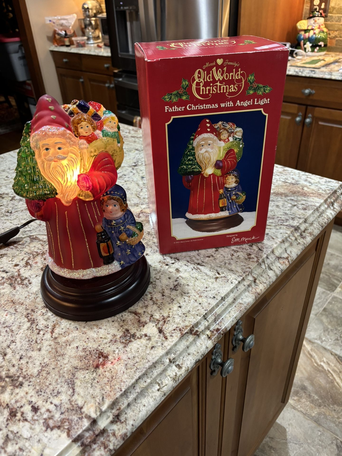 Old world, father Christmas with angel light