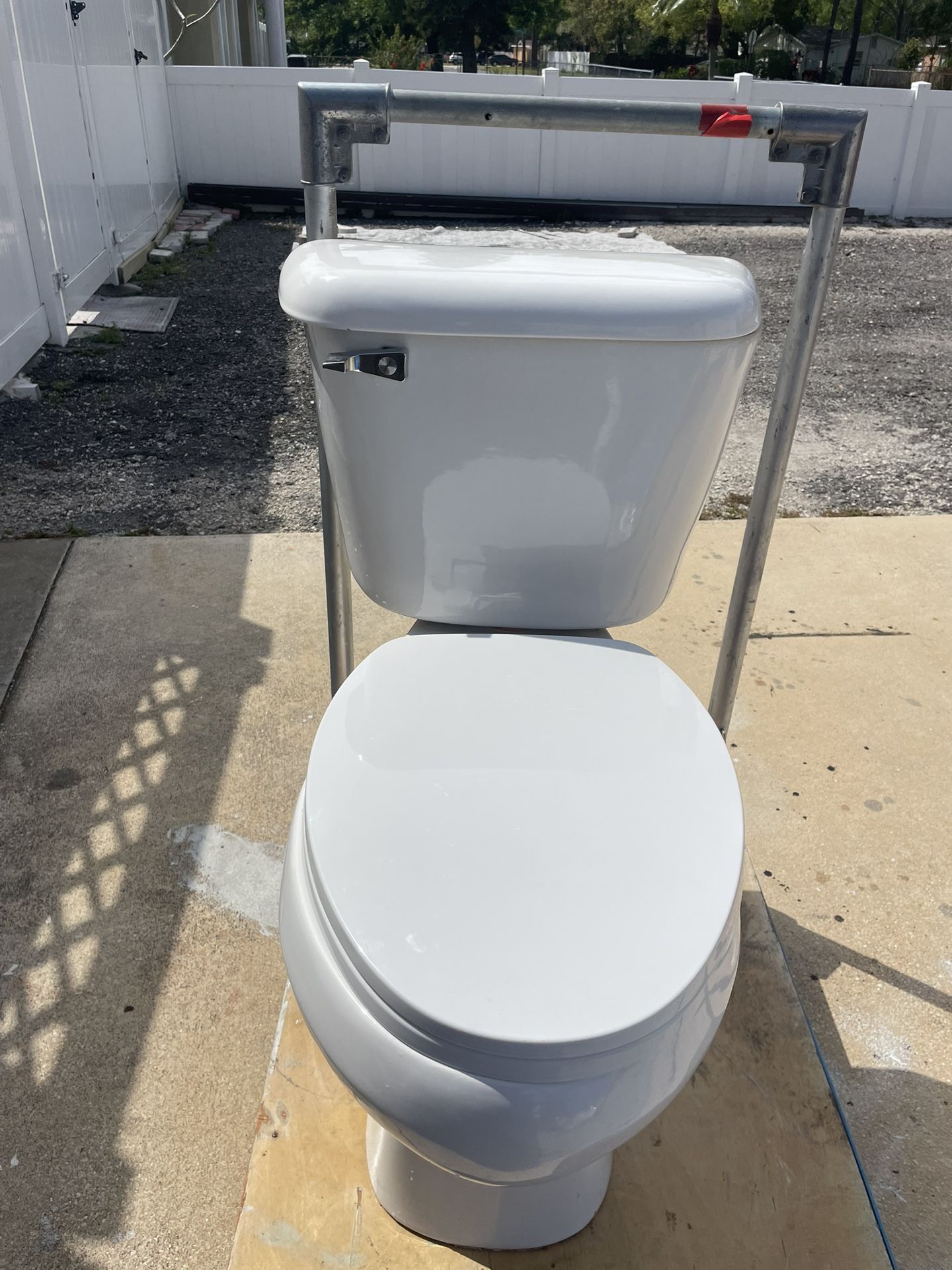 Toilet in good condition, clean, works very well, measures 16 inches high