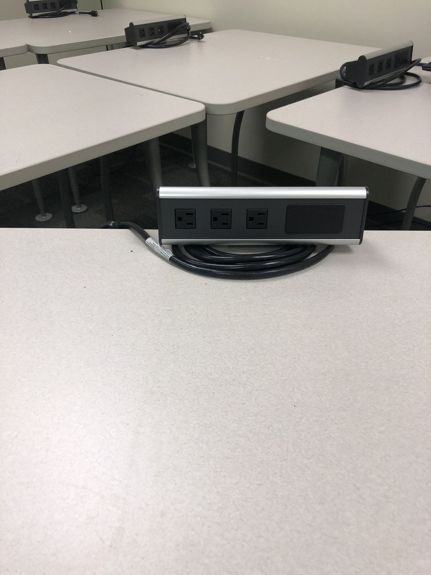 Work desk with surge protector