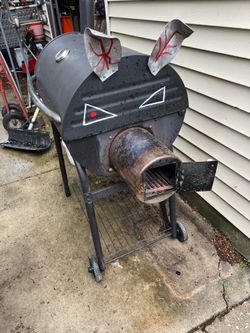 2 custom pig themed smoker grills