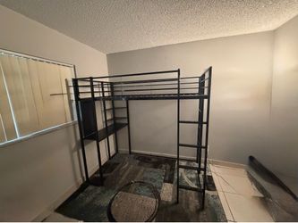 Bunk bed with a desk