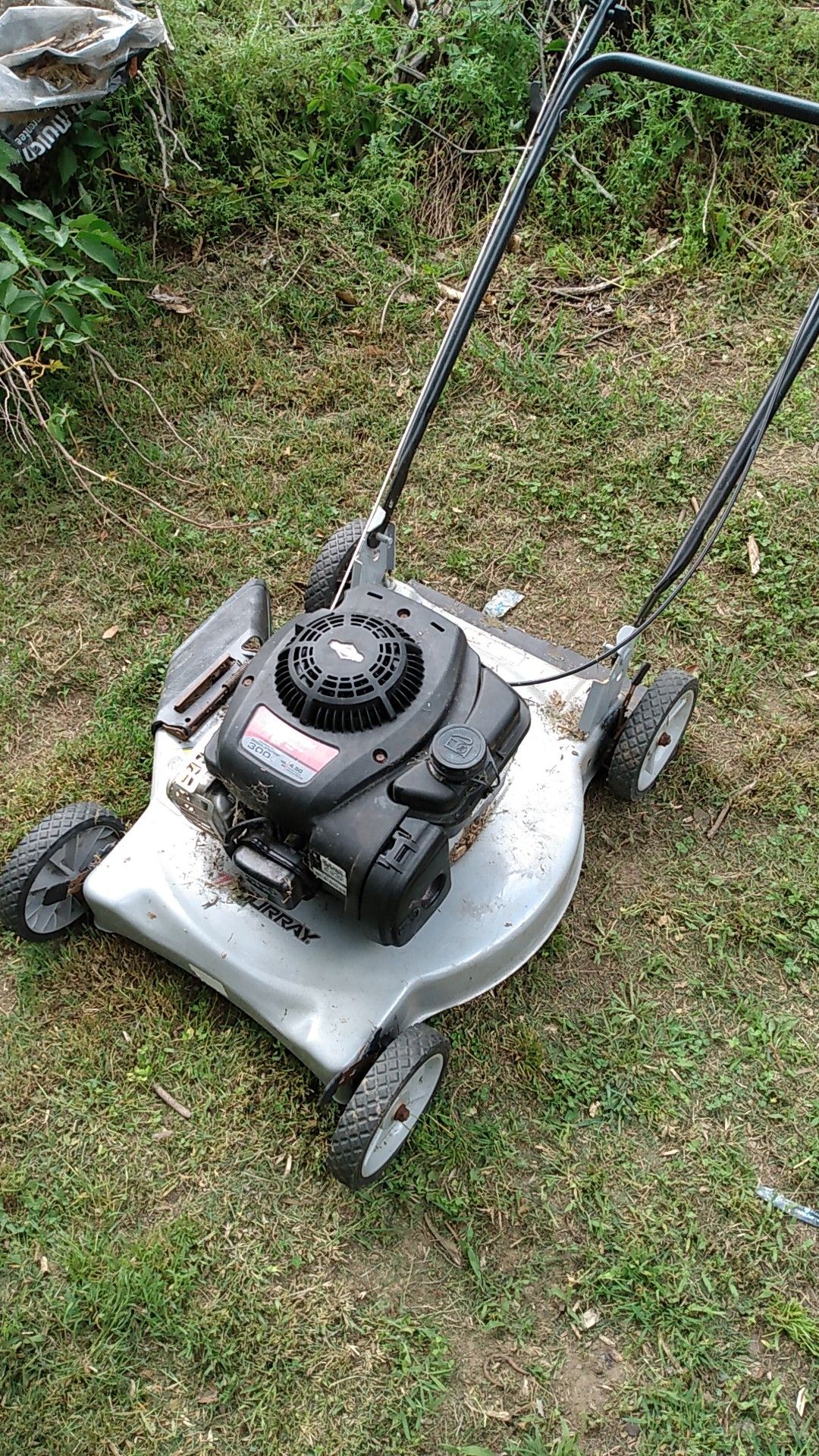 Change the oil in spark plug lawn mower runs great