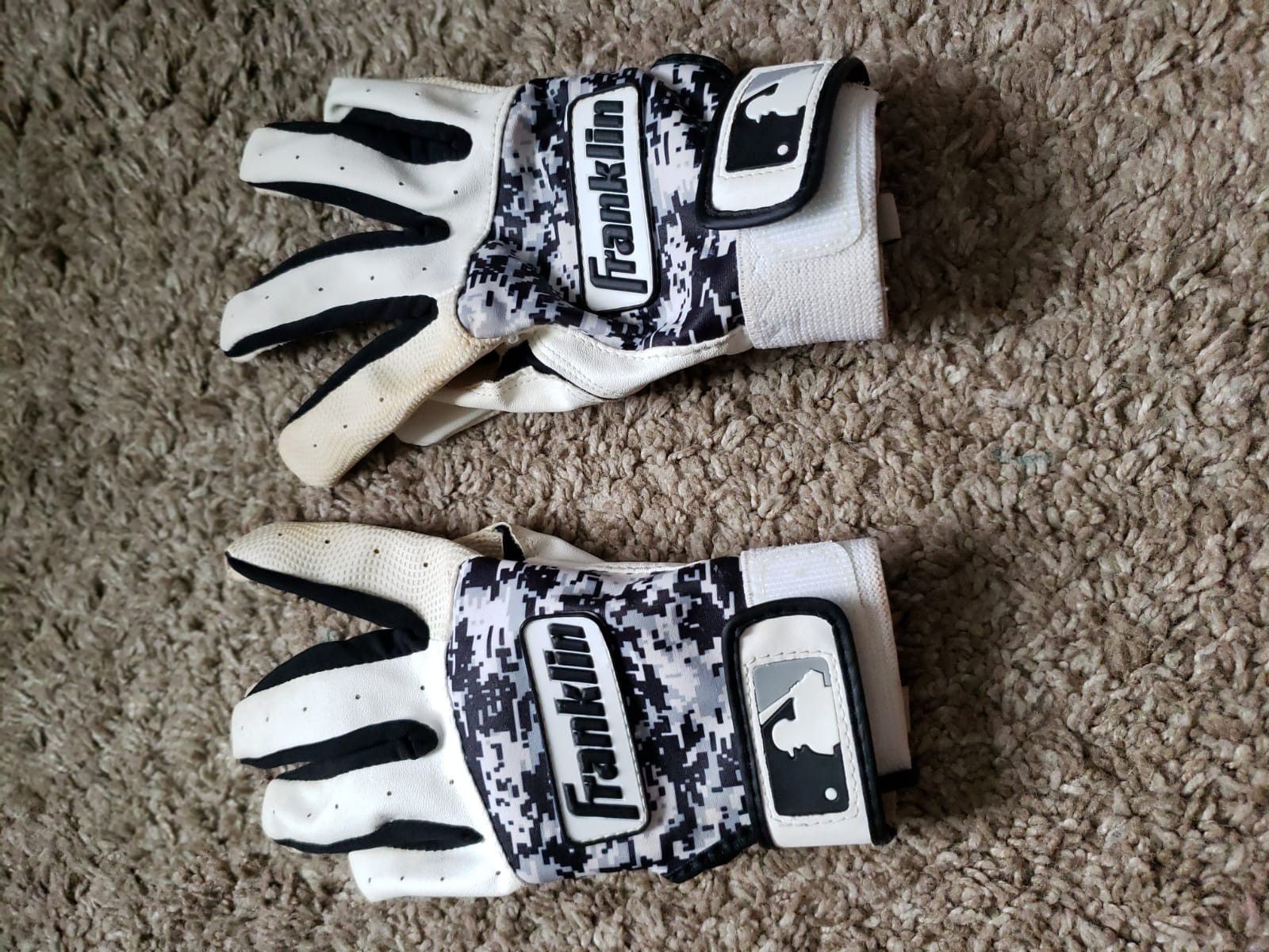 Baseball gloves and bat