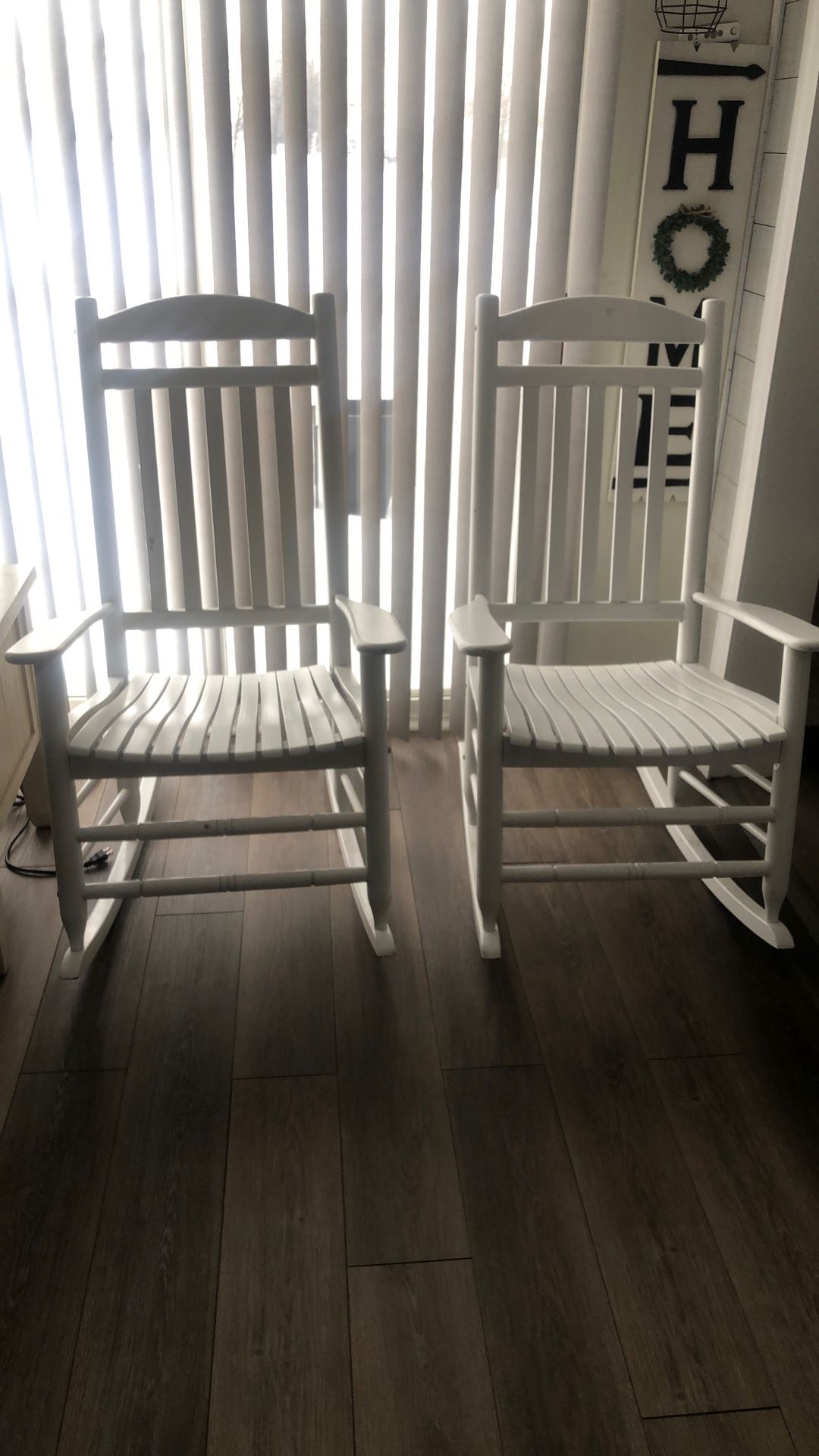 2 WHITE ROCKING CHAIRS